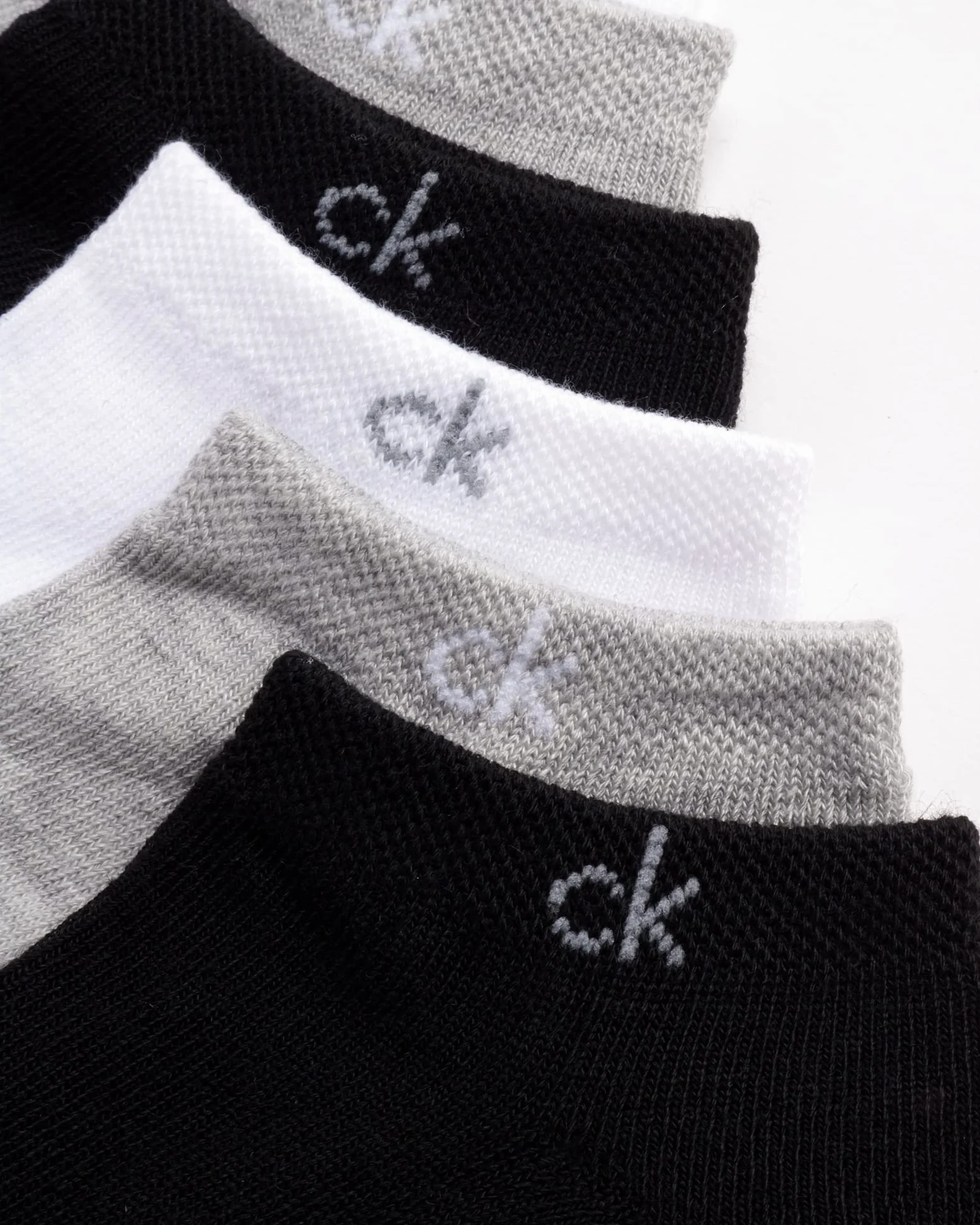 Calvin Klein Calcetines invisibles para mujer, paquete de 12 unidades, suaves, elásticos, transpirables, atléticos, de corte bajo, para mujer (talla de zapato: 4-10)