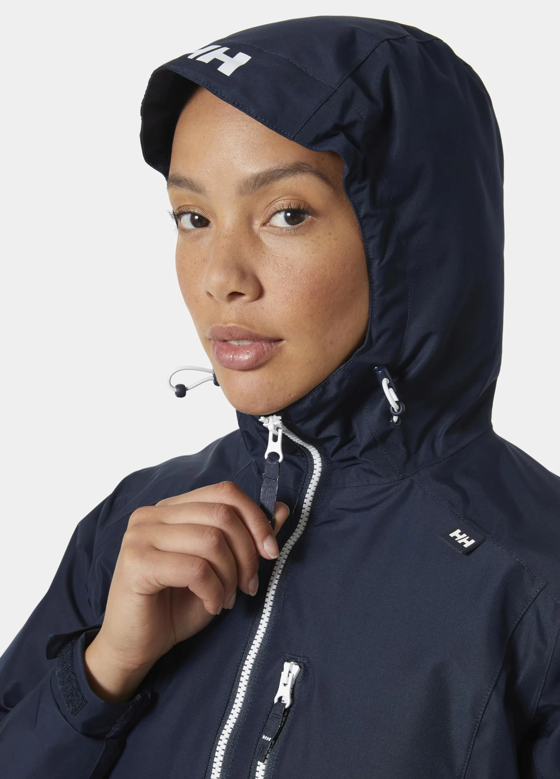 Helly Hansen Chaqueta Mujer Long Belfast – Abrigo Impermeable de Lluvia con Capucha Ajustable y Bolsillos de Cremallera