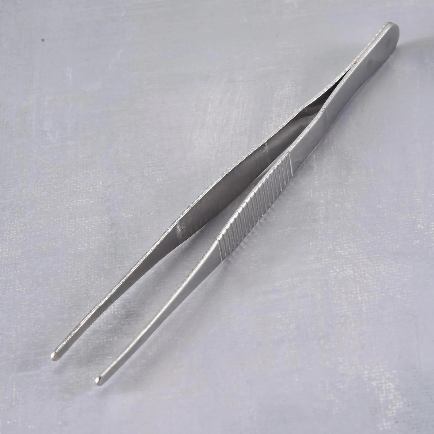 Pinzas de punta redonda de acero inoxidable 5.5 pulgadas